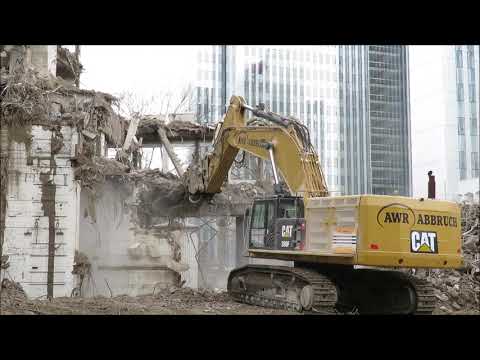 Bagger CAT 390 F Abriss mit mega Zange