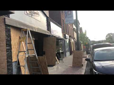 Downtown Taunton businesses brace themselves for civil rights rally by boarding up their windows.