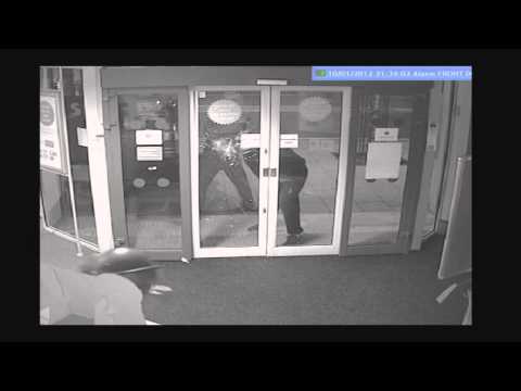 CCTV of robbery at Santander bank in New Malden