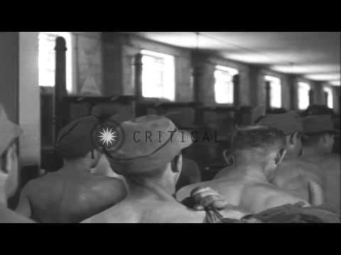 Soldiers of 19th German Army undergo a physical checkup by their own medics at a ...HD Stock Footage Video