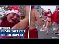 Opmerkelijk: schaars geklede kerstmannen en -vrouwen in Boedapest