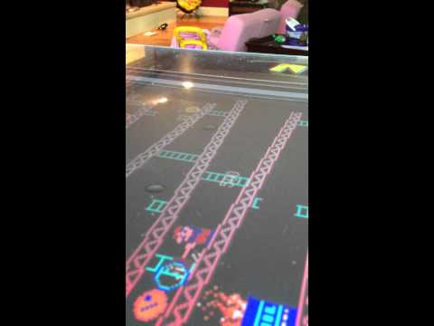 Double Barrel Jump to Hammer then smash Double Barrels 900 points total in Donkey Kong