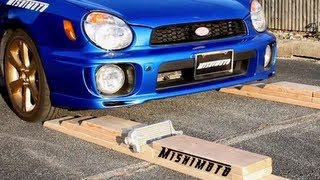 preview picture of video 'Check Out This Epic Battle of David (Mishimoto X-Braced Rad) vs Goliath (Subaru WRX)'