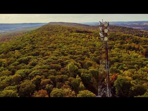 Eine Mikrowellenantenne auf Davids Haus richten