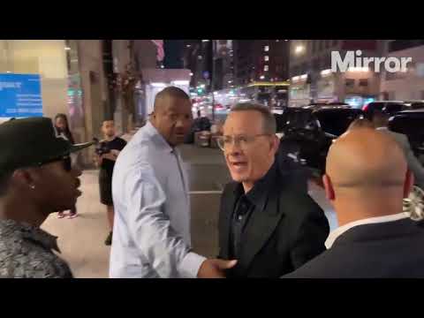 Tom Hanks shouts angrily at wrong fan for tripping his wife.