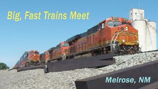 Fast flying, long BNSF Z trains meet in Melrose.