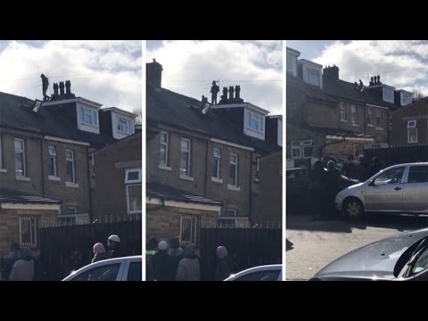 Suspected Burglars Making Getaway On Roof