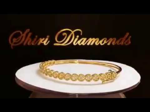 וידאו של צמיד פרחים קשיח מעוטר יהלומים