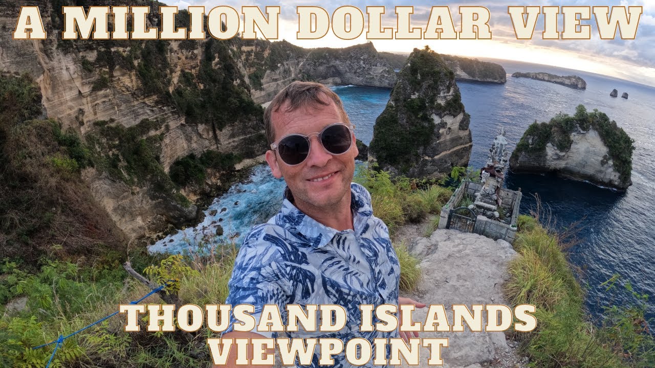 A traveler beholds the breathtaking spectacle of the Thousand Islands Viewpoint.