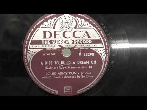 Louis Armstrong: A kiss to build a dream on. (1951).