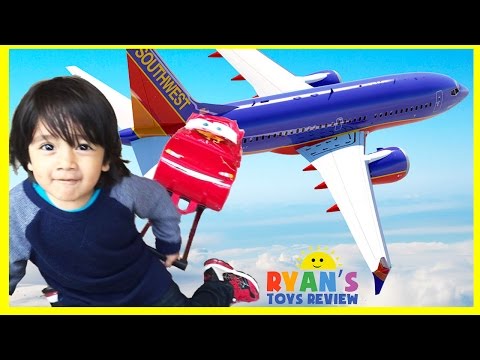 Ryan on the Airplane going to DisneyLand and open toys surprise eggs
