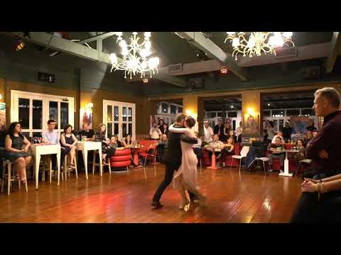  Mariela Soledad Chaves  and  Konstantinos Riginos  are  dancing  to  the  milonga  "  Por la Güella  "  by  Rodolfo Biagi  in  2020
