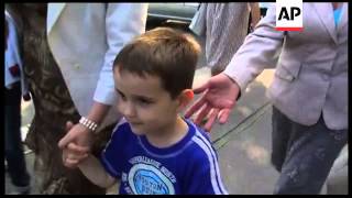 Lawyer says Mladic cried when saw grandchildren, family arriving, leaving court