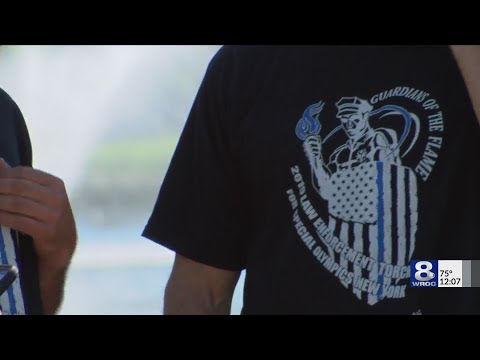 Members of local law enforcement run torch for Special Olympics