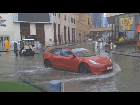 Dubai streets flooded as heavy rain returns to desert UAE | AFP