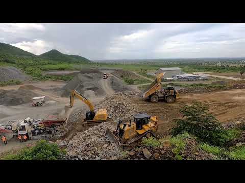 Excavator Loading Rocks On Dump Truck, Caterpillar Excavator 374F, excavator loading crushers