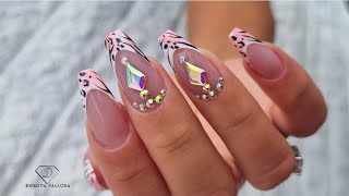 Animal print french nails with a bling. Watch me do gel rebalance in my client.