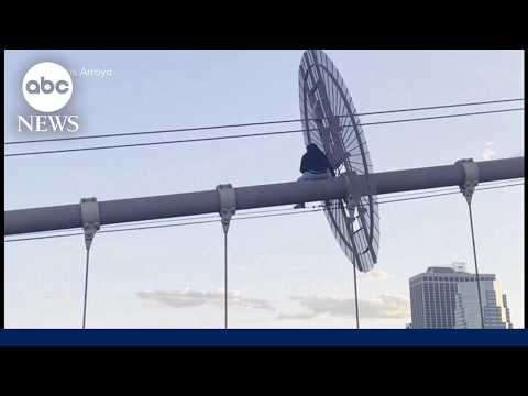 Woman perched on Brooklyn Bridge beam rescued by elite NYPD team