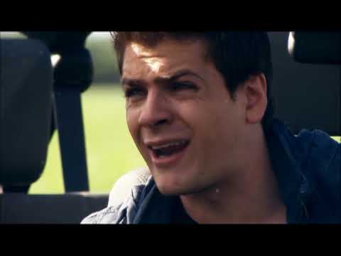 Trailer frame: the leads face off in a sunlit barn; a slow ballad bed underlines the confrontation