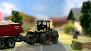 SIKU Control - New Holland T7.315 s předním nakladačem