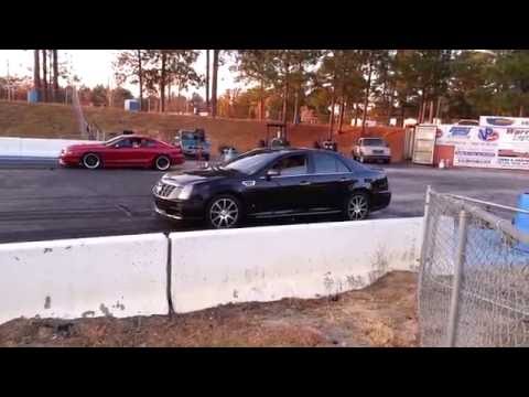 Cadillac STS vs Ford Mustang at the drag strip round 2