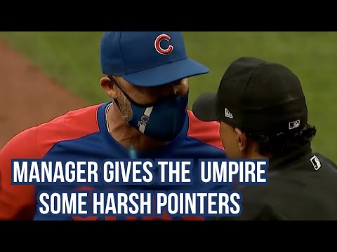 David Ross gives the umpire some pointers after being ejected, a breakdown