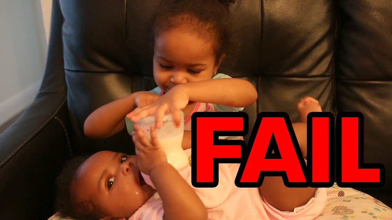 Toddler Tries To Feed and Change Baby Sister