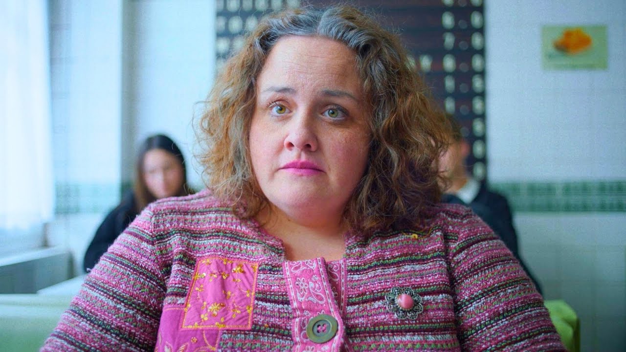 Large beggar woman is stalking a guy, thinking they're dating