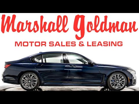 2022 BMW M760i xDrive in Tanzanite Blue Metallic over Smoke White and Night Blue