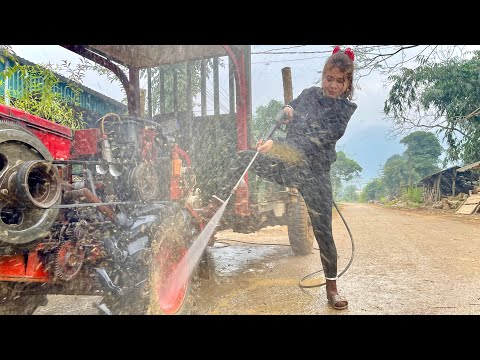 A female mechanic repairs a tractor engine with a leaking gasket.