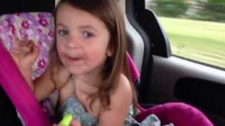 Kennedy eating a Sour Crybaby