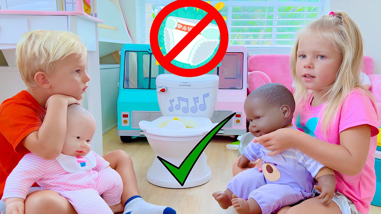 Naomi and David Show Their Baby Dolls How to Go Potty!