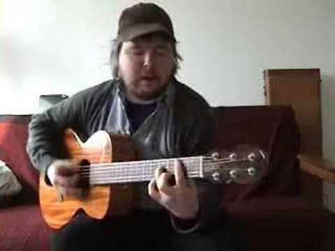 Richard Dawson sings and plays guitar