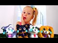 Nastya finge brincar com cachorros de br Nastya finge brincar com cachorros de br