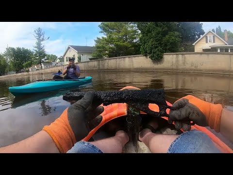 GUN found Magnet Fishing on a KAYAK my first toss of the day! 😂