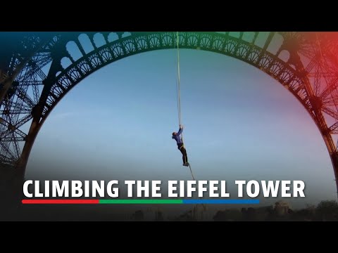 French athlete attempts the world record for rope climbing on Eiffel Tower