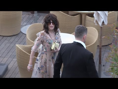 Isabelle Adjani arrives at the L'Oreal beach in Cannes