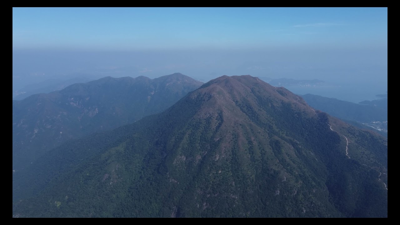 Experience an unforgettable sunset from Sunset Peak’s summit