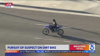 LAPD officers chase suspect fleeing on dirt bike