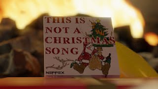 Musik-Video-Miniaturansicht zu This Is Not a Christmas Song Songtext von NEFFEX