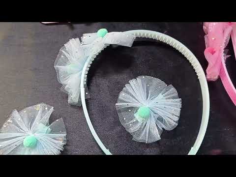 ARQUINHO COM 2 PRESILHAS FLOR INFANTIL