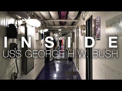 A Short Walk Aboard Aircraft Carrier USS George H.W. Bush As Strike Group Leaves For Deployment