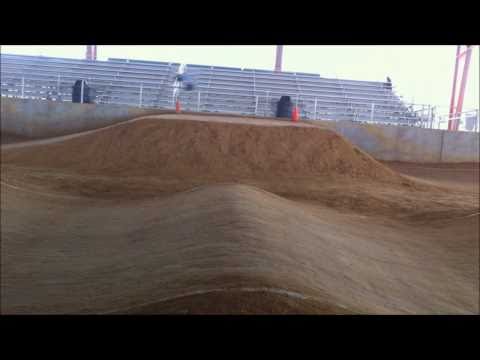 R/C Traxxas E-MAXX Brushless Jumping on Hard Packed Dirt BMX Race Track