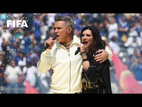 Robbie Williams and Laura Pausini perform 'Desire' at the FIFA Club World Cup