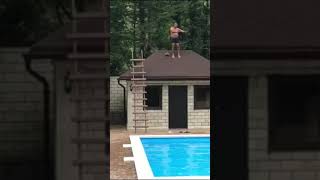 MAN SMASHED FACE ON CONCRETE ATTEMPTING TO JUMP OFF ROOF INTO POOL!!