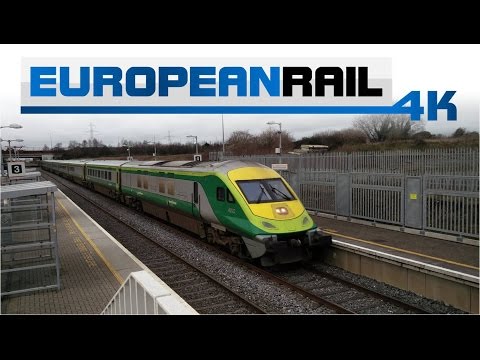 NI Railways 201 loco 8209 + Iarnród Éireann Irish Rail Mark 4 Set 4006 passes Park West