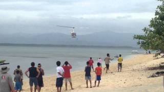 preview picture of video 'Robinson Helicopter Landing by the Beach Front of Marinduque'