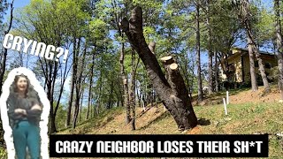 Unhappy neighbor cries over tree removal. (Hazard tree)