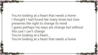 Waylon Jennings - Looking at a Heart That Needs a Home Lyrics