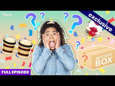 Surprised girl in a denim jacket with confetti, question marks, drums, and a mystery box in a bright thumbnail. The scene suggests surprising contents or an exclusive reveal.